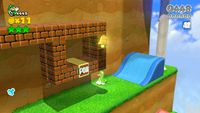 A Super Bell stuck inside a stack of Brick Blocks in Mount Beanpole due to a glitch in Super Mario 3D World