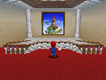 Mario facing the picture of Whomp's Fortress