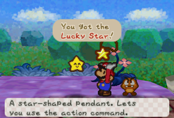 Mario recieveing a Lucky Star from Twink in Shooting Star Summit of Paper Mario.