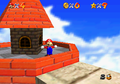Mario at the top of Whomp's Fortress