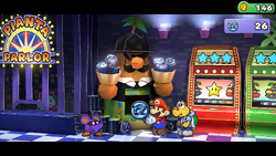 Mario getting the Pianta Tokens from Pianta Changer in Pianta Parlor in Paper Mario: The Thousand-Year Door for Nintendo Switch.