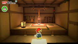 Mario in a house with a Coins inside a lantern and a cupboard in Shogun Studios of The Origami King.