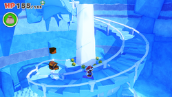 Mario standing near 8 Coins on Ice Vellumental Mountain of The Origami King.