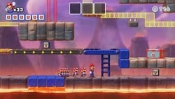 Screenshot of Fire Mountain level 3-mm from the Nintendo Switch version of Mario vs. Donkey Kong