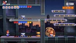 Screenshot of Twilight City Plus level 8-DK+ from the Nintendo Switch version of Mario vs. Donkey Kong