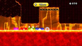 Screenshot of Mario in Three-Legged Lava Race, a Boost Mode Challenge Mode in New Super Mario Bros. U.