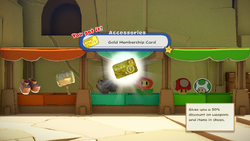 Mario being given Gold Membership Card by item shop shopkeeper in Picnic Road of The Origami King.