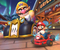 Thumbnail of the Peachette Cup challenge from the Vancouver Tour; a vs. Mega Wario bonus challenge set on Vancouver Velocity (Later reused for the 2nd Anniversary Tour's Toad Cup).