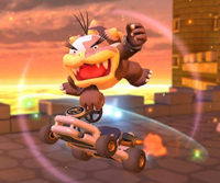The icon of the Baby Peach Cup challenge from the 1st Anniversary Tour and the Birdo Cup challenge from the Bowser vs. DK Tour in Mario Kart Tour
