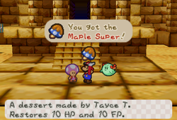 Mario receiveing Maple Super from Trading Event Toad in the scene A3 of Dry Dry Desert of Paper Mario.