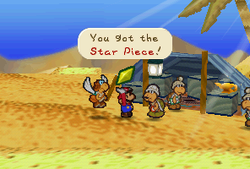 Mario getting a Star Piece from Kolorado for Parakarry's mail delivery in Dry Dry Desert.