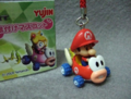 Figurine of Baby Mario driving the Cheep Charger