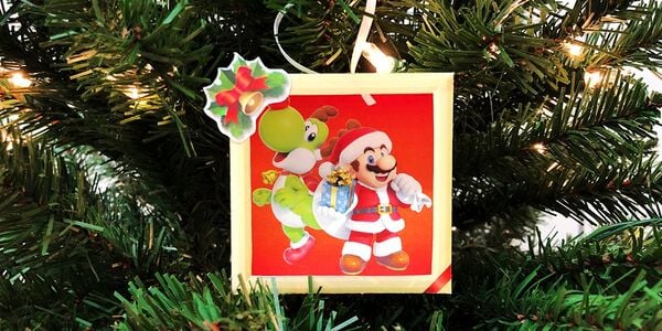 Photograph of a tree ornament featuring Mario and Yoshi