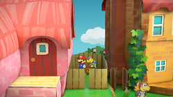 Mario near the Mega Rush P badge in Petalburg of Paper Mario: The Thousand-Year Door for Nintendo Switch.