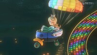 Rosalina races at N64 Rainbow Road.