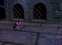 Chunky Kong exploring the exterior of Creepy Castle in the game Donkey Kong 64.