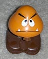 A Goomba figurine that can hop
