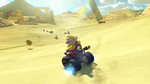 A pre-release screenshot of Wario drifting in the E3 trailer