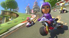 Miis racing through Mario Circuit in Mario Kart 8