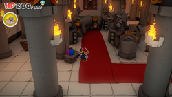 Mario standing near a Small Bag of Confetti in Bowser's Castle of The Origami King.