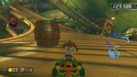 Screenshots of several racetracks with barrels