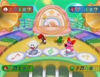 Two players winning in the Mario Party 7 minigame Catchy Tunes