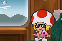 An attached image of Zip Toad (with a Jr. Troopa in the background) from the Mailbox SP in Paper Mario: The Thousand-Year Door.