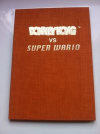 A binder of Donkey Kong vs. Super Wario, one of the earlier concepts before Donkey Kong Country