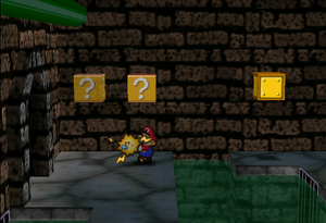 Image of Mario revealing a hidden ? Block in Toad Town Tunnels, in Paper Mario.