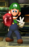 Luigi finds a red Stone in the Kitchen.