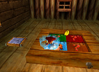 A yellow Banana Bunch and a setup for a Golden Banana for Donkey Kong in Crystal Caves.