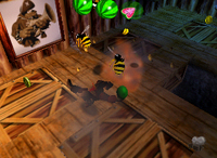 A yellow Banana Bunch, a set of yellow Bananas and a setup for a Golden Banana for Donkey Kong in Crystal Caves.