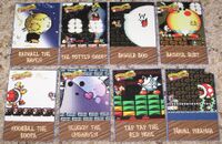 Front and back of Nintendo Power's "Super Power Club" cards.