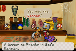 Mario receiveing a Letter from the owner of the Little Mouser's Shop in Dry Dry Outpost of Paper Mario.