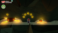 Mario standing near 6 Coins in Earth Vellumental Temple of The Origami King.