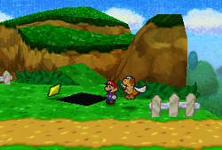 Mario finding a Star Piece under a hidden panel near Goomba King's Fortress in Paper Mario