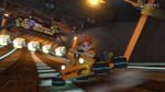 Princess Daisy, racing on Wario's Gold Mine, in Mario Kart 8