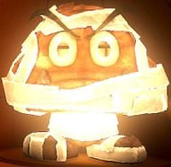 A Paper Macho Mummy Goomba in Paper Mario: The Origami King.