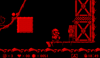 Wario next to an elevator in Virtual Boy Wario Land