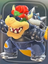 Bowser's Biker outfit on the character select screen in Mario Kart World