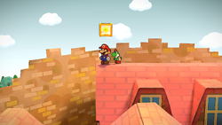 Mario next to the Shine Sprite on the roof of the north house in the east area of Rogueport in the remake of the Paper Mario: The Thousand-Year Door for the Nintendo Switch.