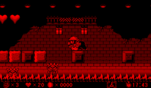 Screenshot of Wario with two Fire Octopuses, from Virtual Boy Wario Land.