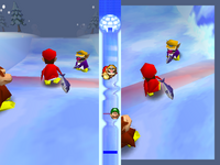Filet Relay from Mario Party 2. Donkey Kong is passing the fish to Wario