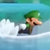 Squared screenshot of Mini Luigi from New Super Mario Bros. Wii.