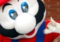 The Mario mascot costume with a dog