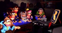 Artwork of Cranky Kong playing Nintendo 64 in Wrinkly's Save Cave and the other Kongs watching.