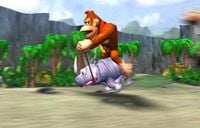 Donkey Kong Racing beta screenshot: Donkey Kong on a "Mini-Rambi"