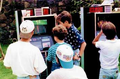 Participants playing arcade machines