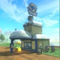 A cow-themed Yoshi's drive-through near Moo Moo Meadows with a blue-yellow logo