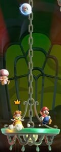 Screenshot of a chandelier from Super Mario Bros. Wonder